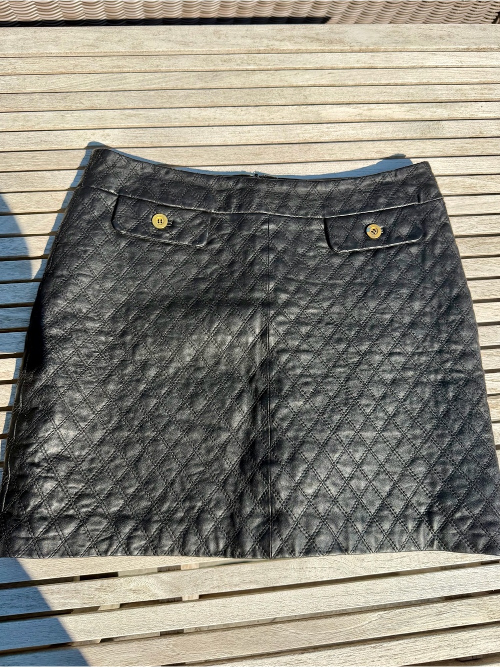 Black Quilted Mini Skirt with Decorative Button Pockets